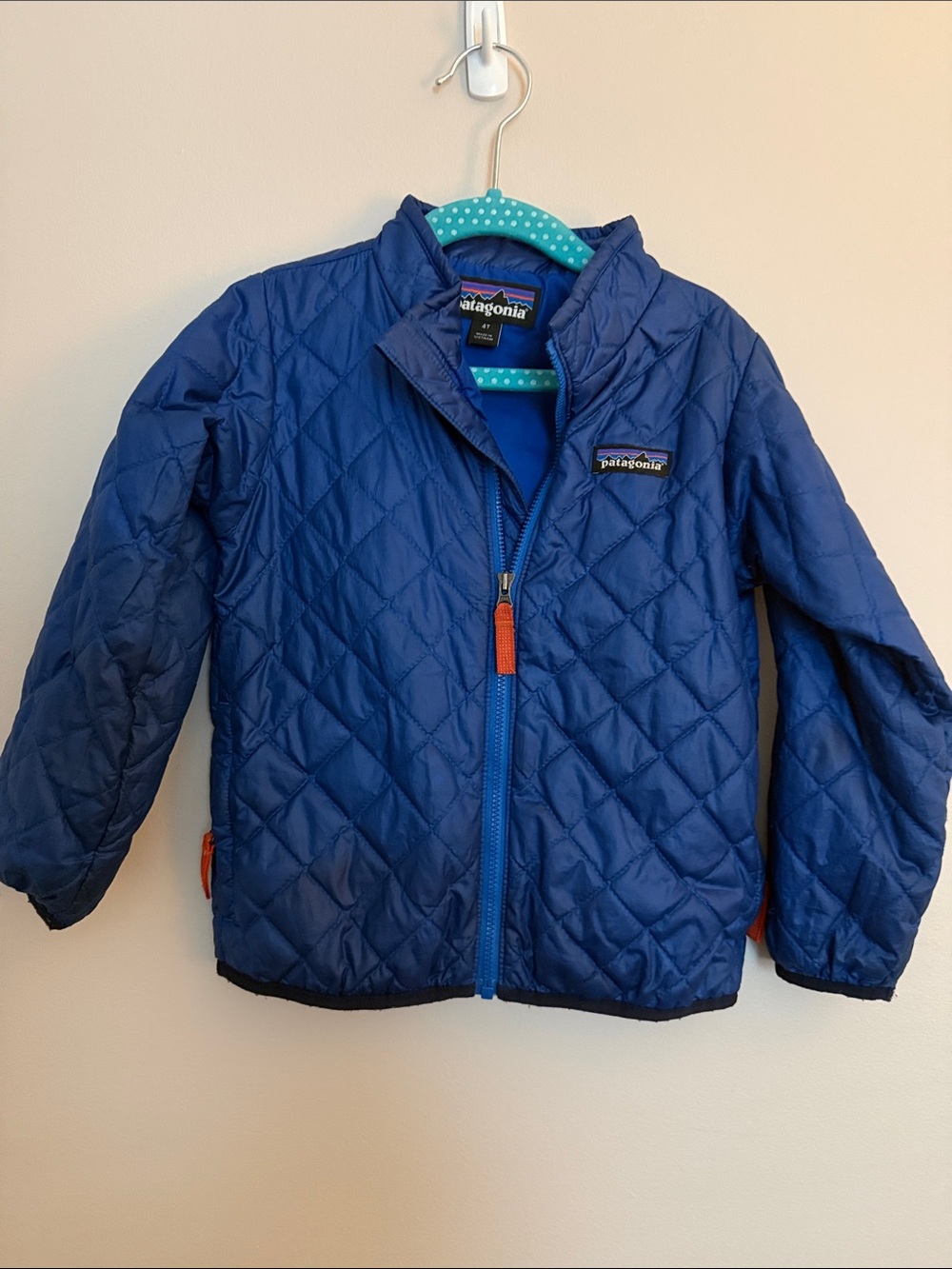 Patagonia Kids Quilted Blue Puffer Jacket with Orange Zipper Pulls